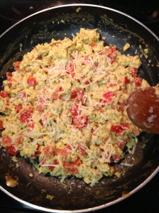 Scramble eggs with salt and pepper, and add them to the pan.  Stir often to keep eggs soft and protect them from drying out.  When they're nearly done, add cheese (I used a bit of gorgonzola and some shredded parm) and stir til melted.