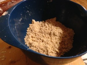 During the pie's initial bake (again, see below), mix the crumb topping ingredients til you have coarse crumbs.