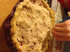 Sprinkle on pie and reinsert in the oven for remaining bake time.